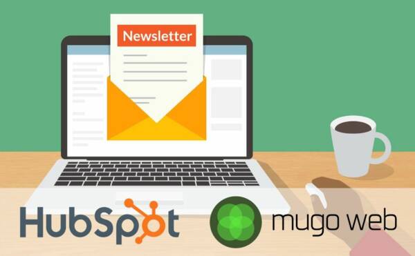 an illustrated desk with a computer, coffee mug, and hand holding a computer mouse. The computer screen displays an open envelope with Newsletter across the top. The HubSpot and Mugo logo are displayed at the bottom.